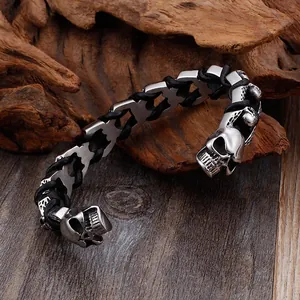 Vintage men's titanium steel skull cuff bracelet featuring black leather cord wrapping