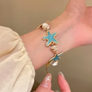 Mint green starfish bracelet with pearls for beach vacation style