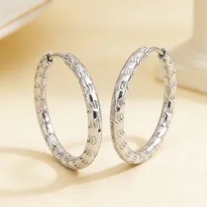 Elegant textured stainless steel large hoop earrings with unique engraved pattern finish