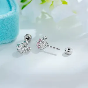 Elegant star-shaped stud earrings with pink and clear zircons in titanium
