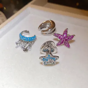 Set of sparkling zircon starfish and moon ear cuffs for non-pierced ears in silver finish