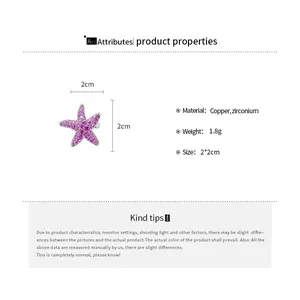 Macro view of pink zircon starfish ear clip with dimensions and material specs