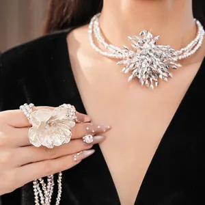 Elegant luxury statement multi-layer beaded necklace and flower ring set on model