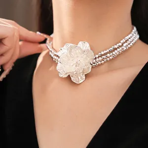 Elegant silver multi-layer beaded choker necklace featuring a large 3D flower pendant