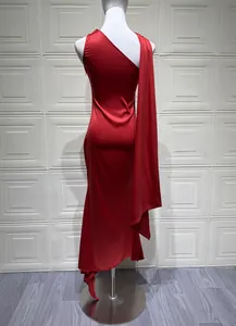 Back view of a red one-shoulder satin evening gown showing elegant draped fabric detail