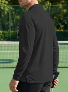 Back view of a man wearing a black long-sleeved quick-dry polo shirt on a tennis court