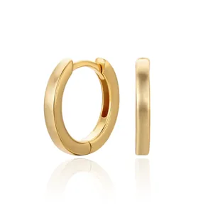 Close-up of minimalist S925 sterling silver gold-plated hoop earrings with smooth finish