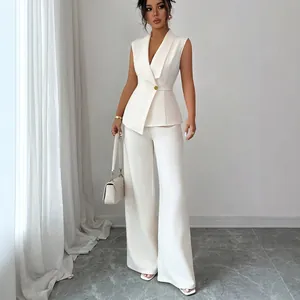 Elegant white sleeveless vest and straight trousers set for women's autumn fashion.
