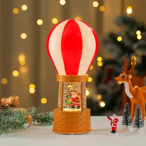 Festive Christmas hot air balloon snow globe with warm LED night light