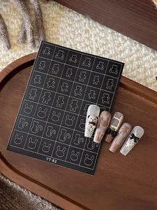 Cute bear and rabbit hollow-out nail art stickers for professional DIY manicure designs.