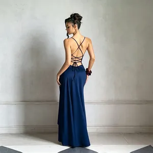 Elegant navy blue backless evening dress with criss-cross straps and long satin skirt.