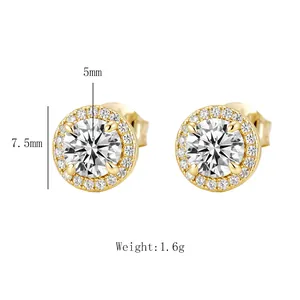 Detailed product view of round gold halo stud earrings with 5mm cubic zirconia center