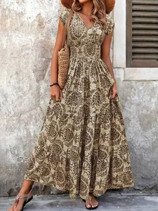 Elegant vintage printed maxi dress featuring a V-neck design and bohemian paisley patterns