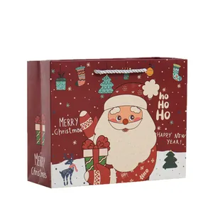 Large horizontal Christmas paper gift bag with cute Santa Claus and reindeer design