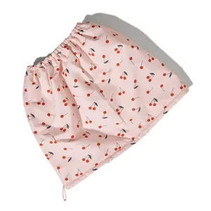 Triple layer waterproof shower cap in light pink with cute red cherry pattern print