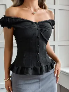 Detailed view showing black off-shoulder Y2K top with ruffled trim and button front