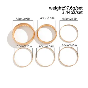 Close-up showing precise diameter measurements for the golden bangle jewelry set