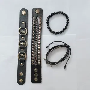 Detailed set of 4 punk style men's bracelets featuring rivets, chains, and skull charms