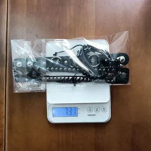 Weight measurement detail of 4pcs punk rivet leather bracelet set on a digital scale