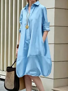 Elegant light blue oversized button-down shirt dress for women for casual wear