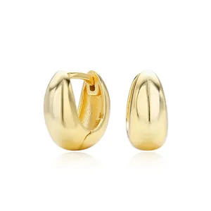 Detailed close-up of glossy gold-plated S925 silver chunky bean hoop earrings.