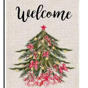 Festive Christmas garden flag featuring a watercolor tree and gifts on burlap texture