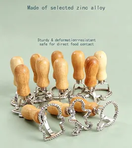 Detail of zinc alloy cookie molds with ergonomic wooden handles