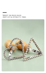 Detail of heart and triangle ravioli cutters with serrated edges and wooden handles