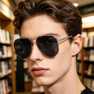 Close-up view of a male model wearing stylish silver polarized aviator sunglasses for driving
