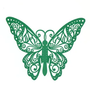 Vue détaillée des motifs ajourés découpés au laser sur le papillon en papier vert.