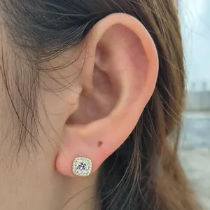 Elegant S925 sterling silver square halo stud earrings with sparkling cubic zirconia on ear