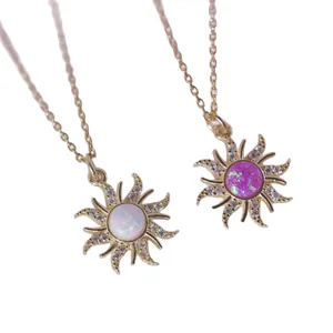 Vintage sun necklaces featuring white and pink opal pendants with micro-pave zircon details