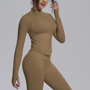 Detail showing the khaki ribbed knit yoga jacket with high collar and full zipper closure