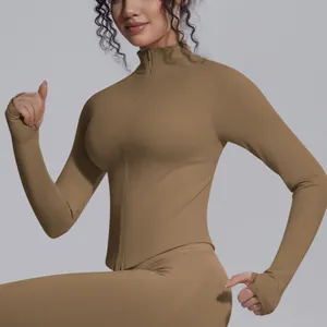 Side view of a slim fit stand-collar yoga jacket with zipper and thumbholes