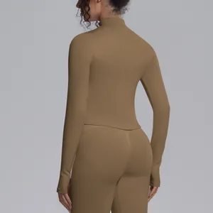 Back view of professional slim-fit women's stand-collar knitted yoga jacket in taupe.
