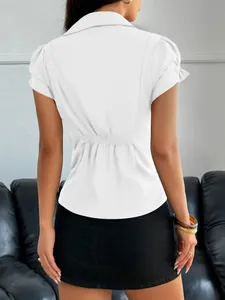 Rear view of women's white short-sleeve shirt showcasing elegant cinched waist detail