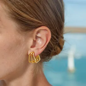 Minimalist gold stainless steel square hoop earrings with a geometric line layered design