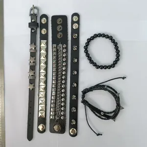 Set of six black punk-style leather and beaded bracelets featuring gothic metal rivets.