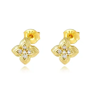 Elegant S925 sterling silver gold-plated four-leaf clover stud earrings with sparkling zirconia