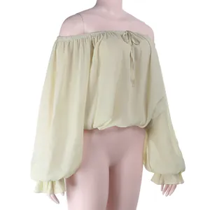 Elegant light beige off-the-shoulder blouse with lantern sleeves and drawstring detail