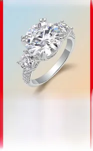 Close-up of 5-carat moissanite ring in 925 silver with thick gold plating
