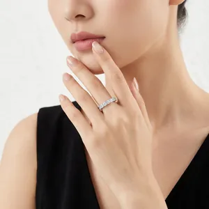 Elegant S925 sterling silver moissanite eternity wedding band ring worn by a model