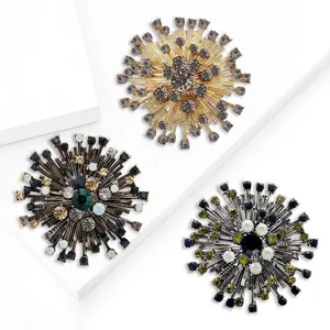 Broches vintage en forme de feu d'artifice avec strass de luxe pour costumes chic.