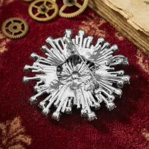 Broche vintage en forme de feu d'artifice argenté, accessoire chic pour manteaux