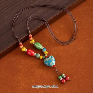 Handmade ethnic style ceramic beaded necklace with heart pendant, weight 42g/1.48oz