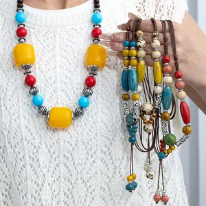 Hand-woven Jingdezhen ceramic beaded necklace in vibrant ethnic style for women