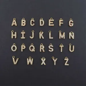A complete set of 26 gold-plated alphabet pendants with sparkling rhinestones for DIY