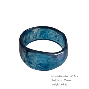 Blue marble resin bangle with irregular shape, 68.7mm inside diameter, vintage style.