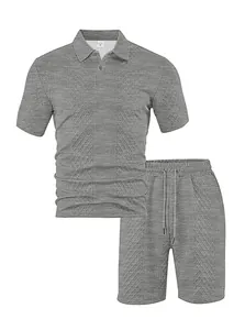 Close-up of men's grey jacquard polo shirt and shorts set with textured fabric