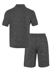 Back view of dark grey textured jacquard men's polo shirt and matching shorts set